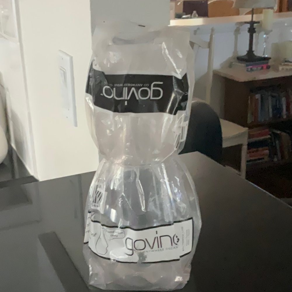 Govino Shatterproof Go Anywhere Carafe Set. New without box but wrapped.